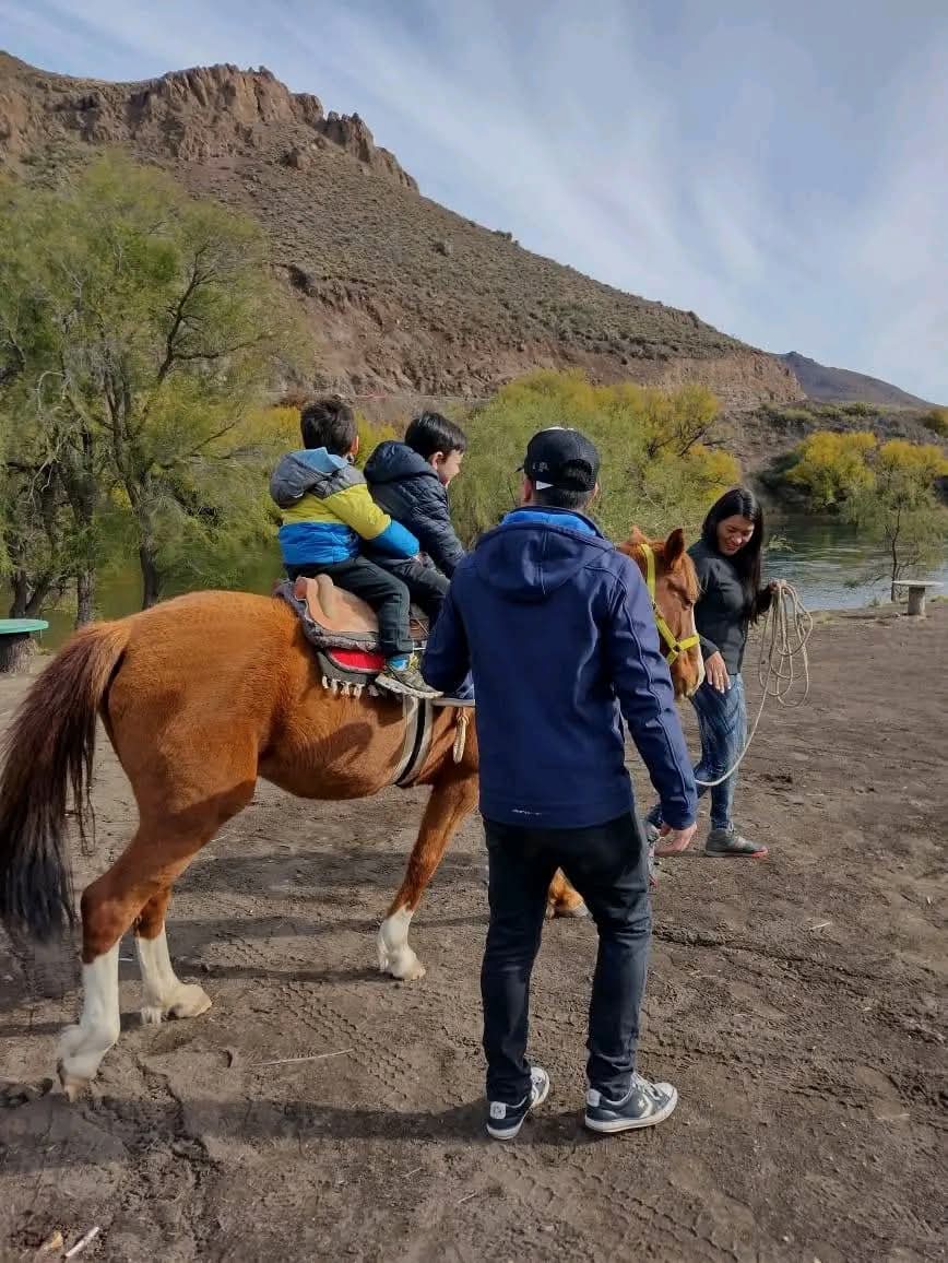 Family enjoying peaceful outdoor activities in rural Patagonia